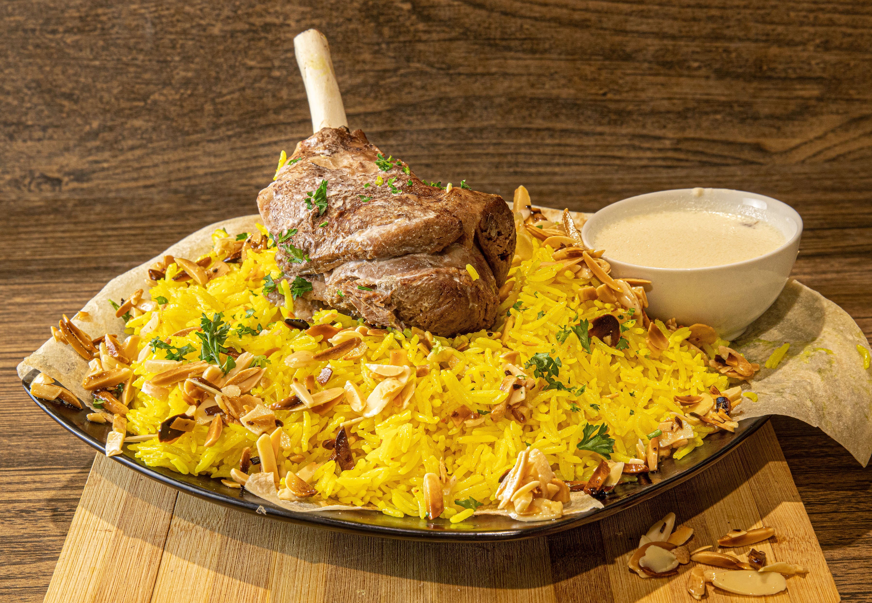 Lamb thigh served with rice