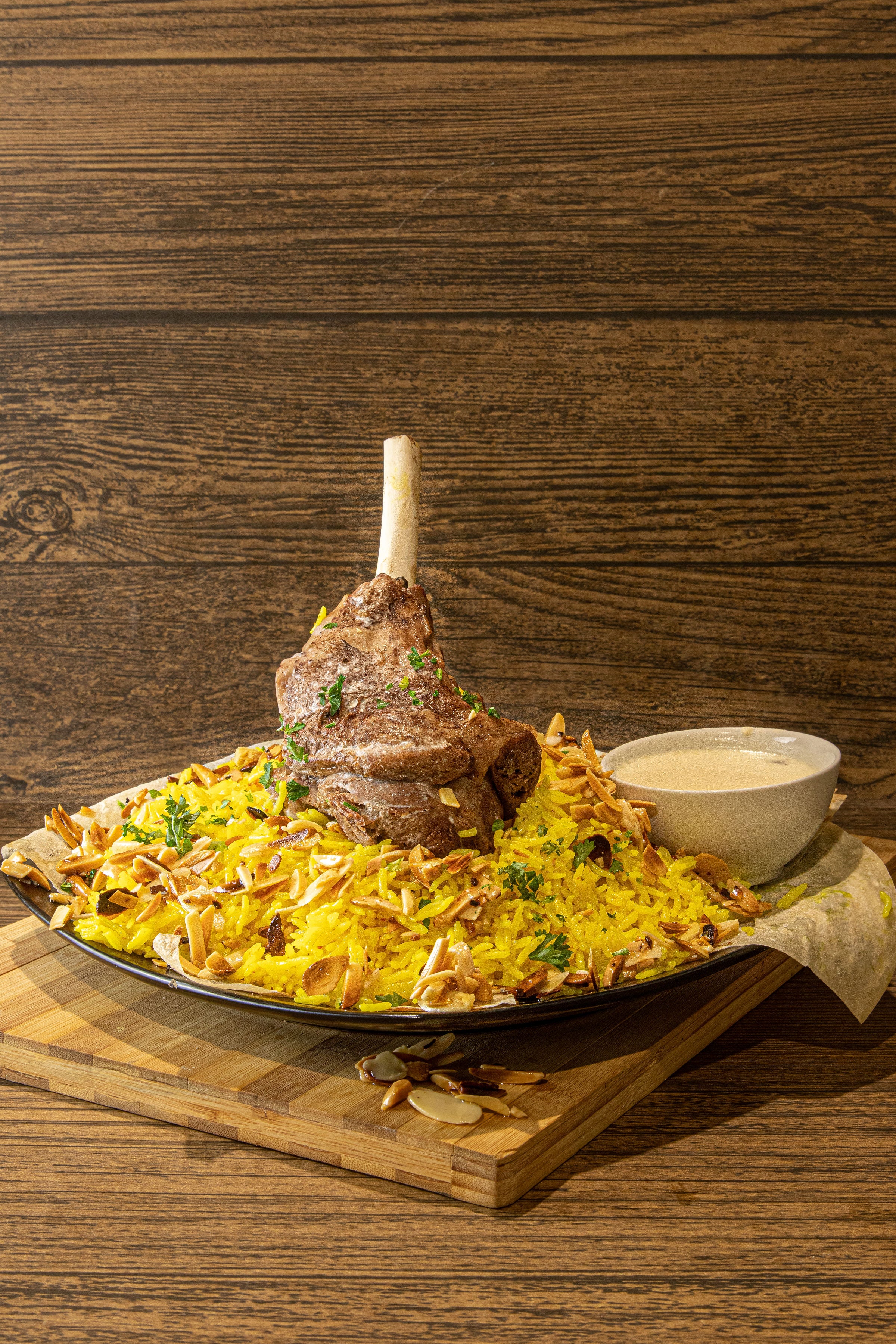 Lamb thigh served with rice